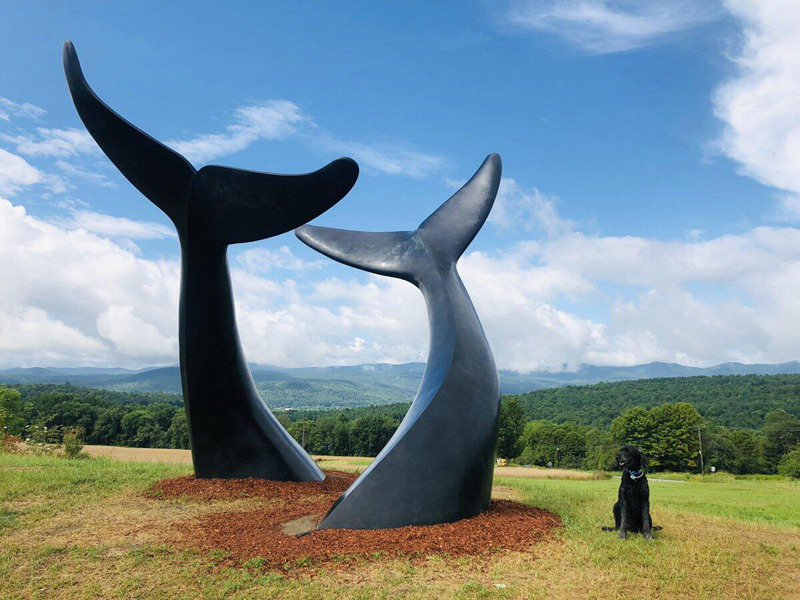 bronze whale tail sculpture