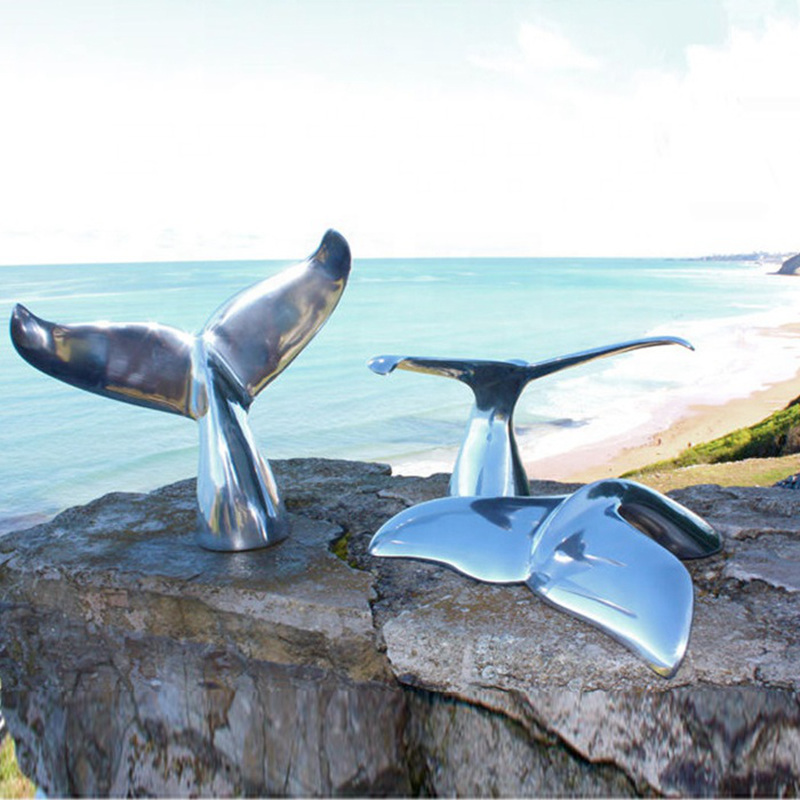 stainless steel whale tail sculpture