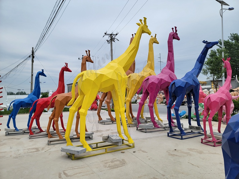 panited giraffe sculpture