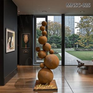 corten steel ball sculpture