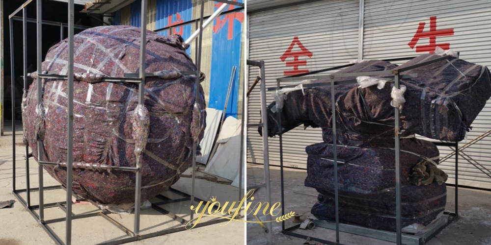 packaging of large metal globe sculpture