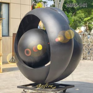 black metal sculpture in factory