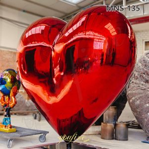 large stainless steel red heart sculpture