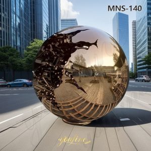 metal sphere within sphere sculpture