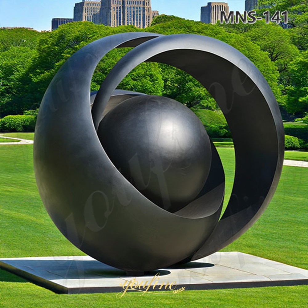 Abstract Black Metal Sculpture with Ball