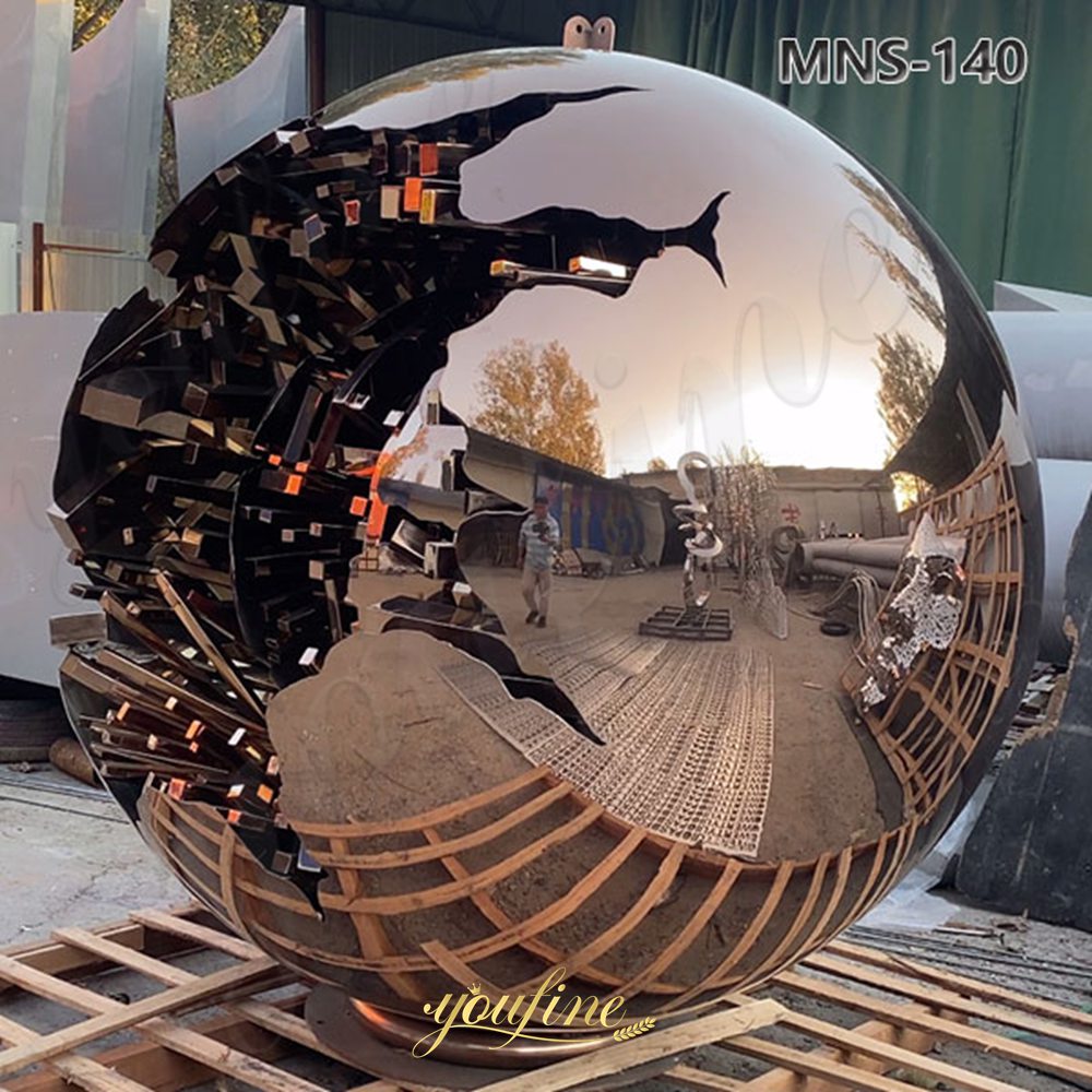 steel sphere within sphere sculpture