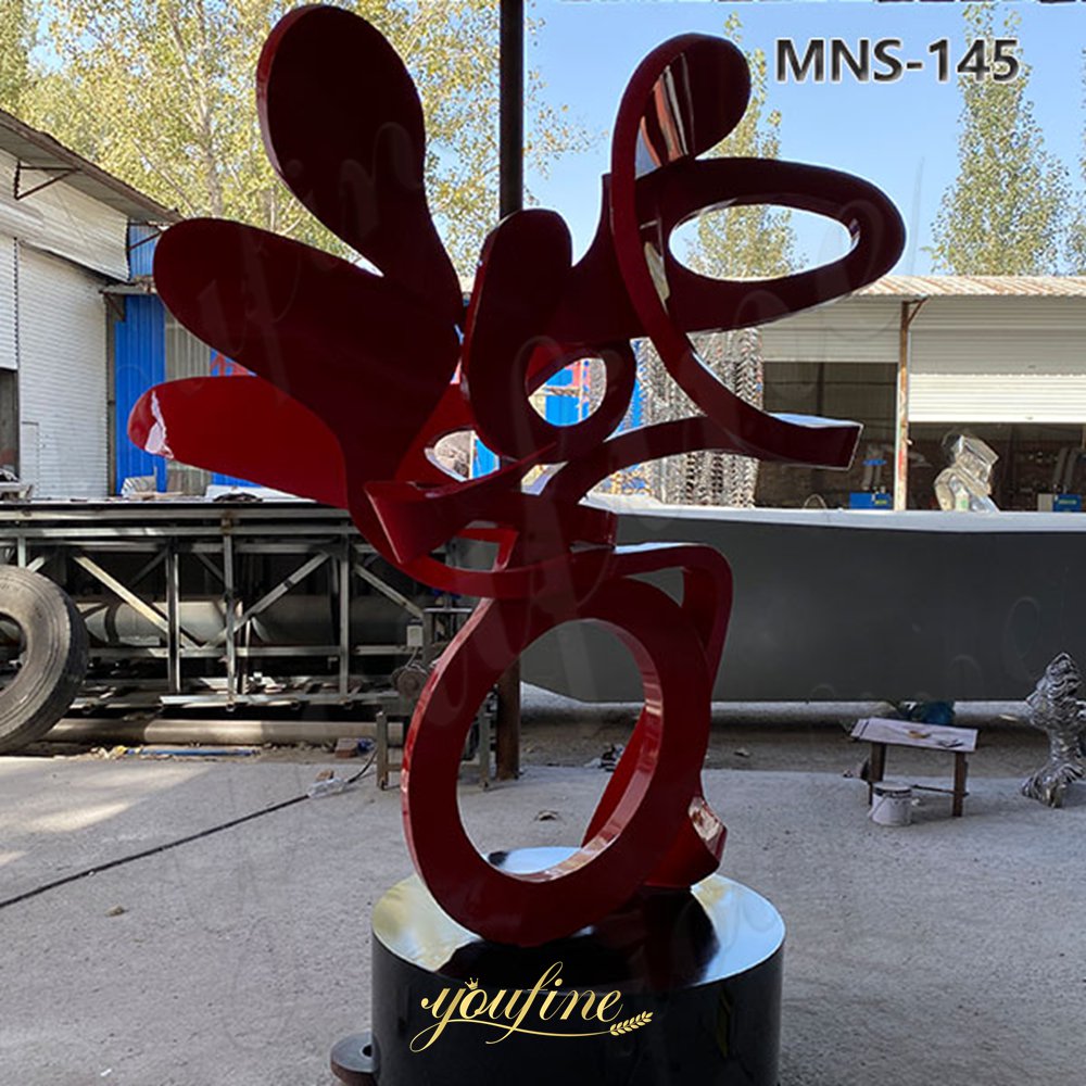 back of red abstract sculpture