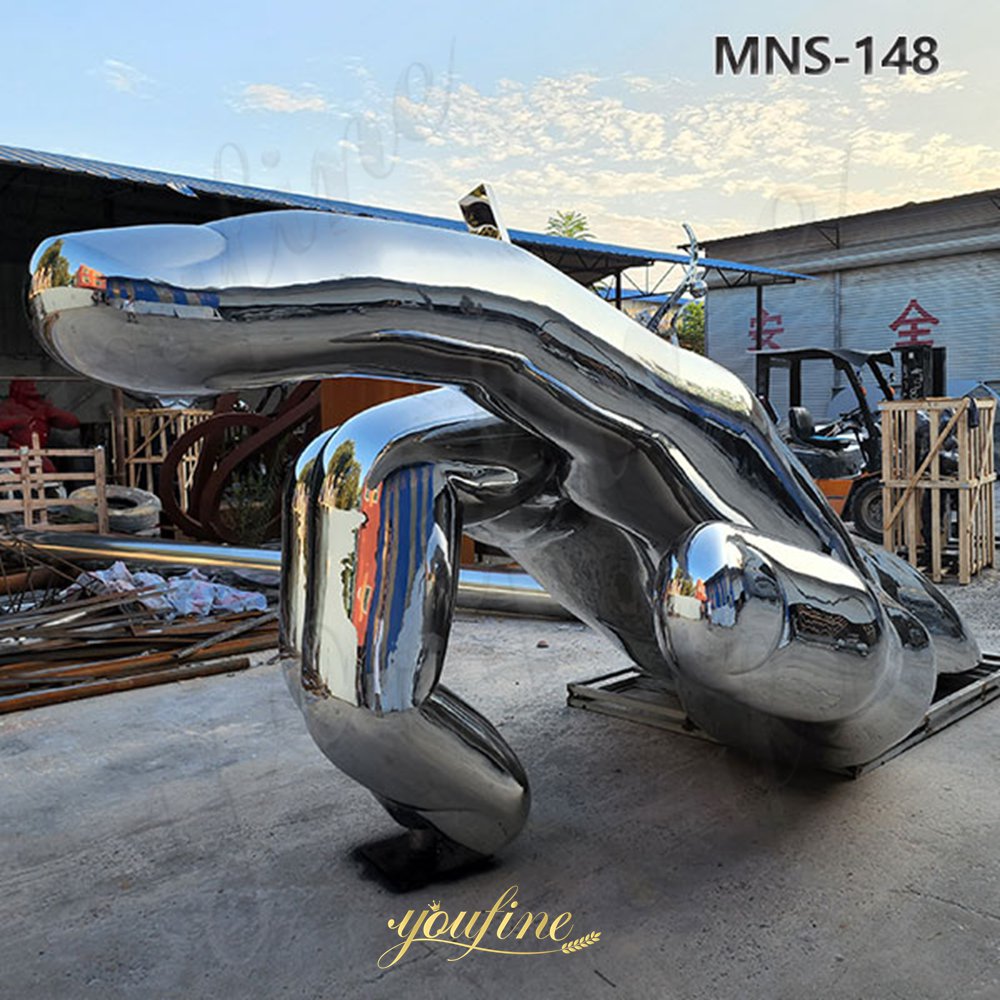 large metal finger sculpture