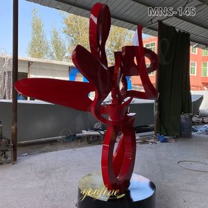 red stainless steel abstract sculpture
