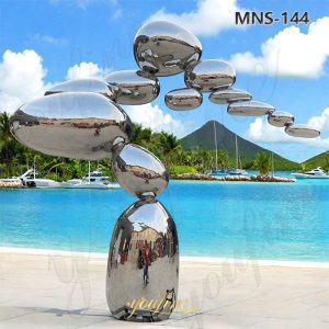 tall metal pebble sculpture