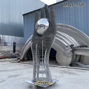 large hand sculpture art