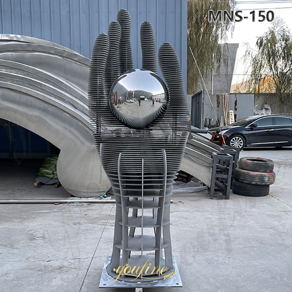 metal hand sculpture decor