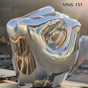 mirror metal fist sculpture