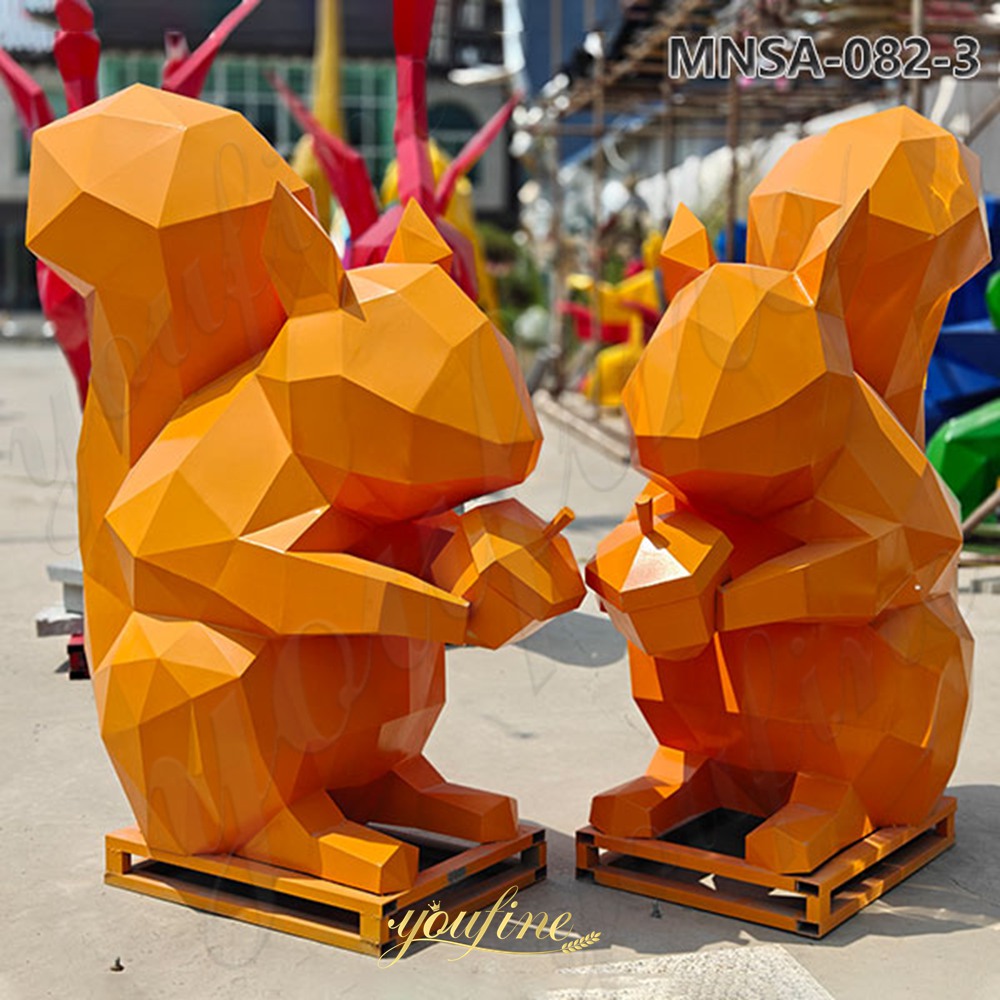orange metal squirrel sculpture