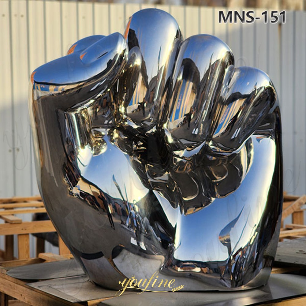 stainless steel fist sculpture