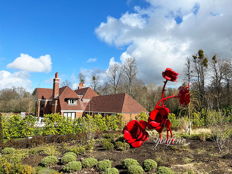 Stainless steel rose sculpture in home garden