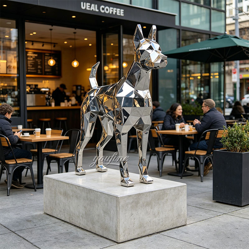 Geometric stainless steel dog at cafe entrance