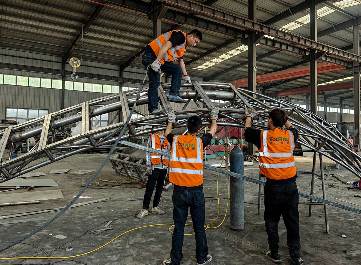 Stainless steel sculpture surface finishing in the factory