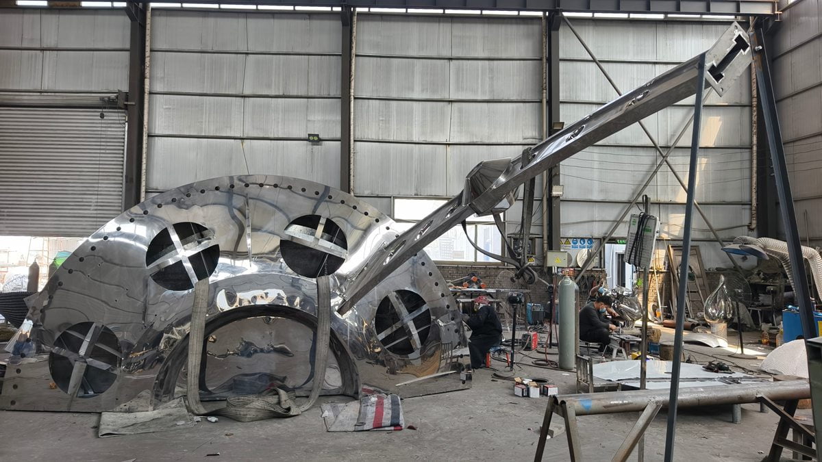 Nearly completed mirror polished park sculpture